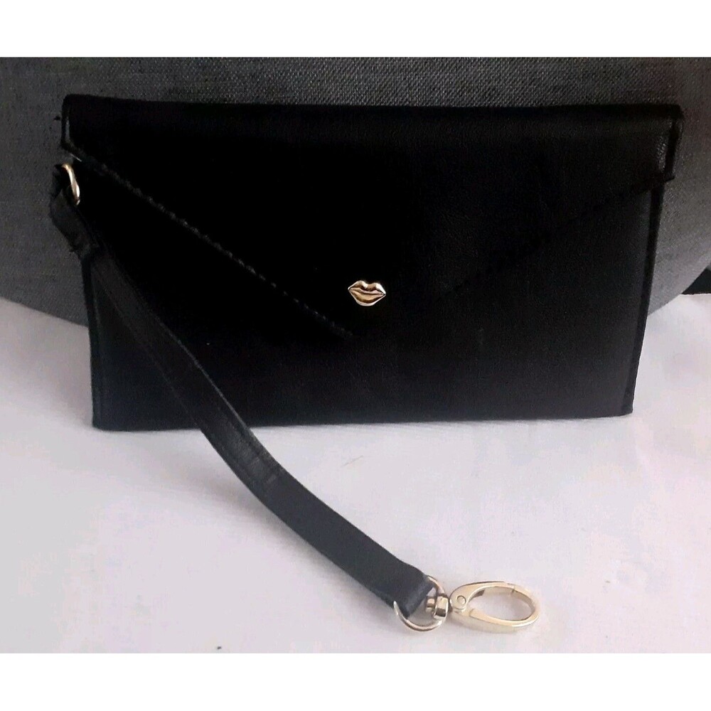 Betsey Johnson Black Wristlet Purse. Accessory and makeup bag